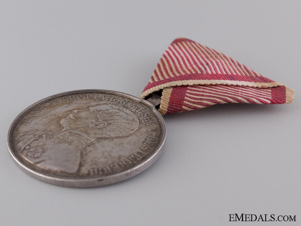 an_austrian_silver_bravery_medal1_st._cl.1859-1866_img_05.jpg5433095b7de46