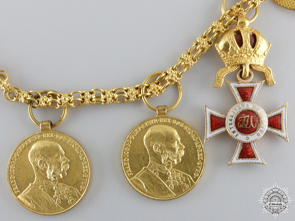 austria,_empire._an_leopold_order_miniature_award_chain_in_gold,_with_case_by_v._mayer_img_06.jpg54c696963cc97_1_1