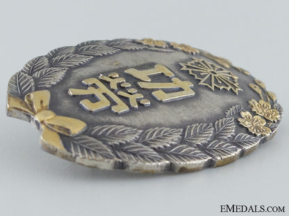 greater_japan_civil_defence_and_police_association_special_award_badge_img_06.jpg53650d9ddde82