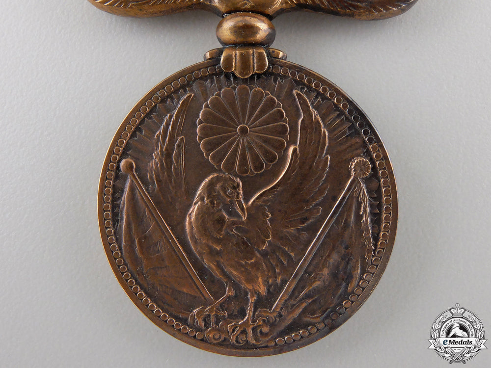 japan,_empire._a1937_china_incident_medal_with_case_img_06.jpg5553a64a56b1b_1