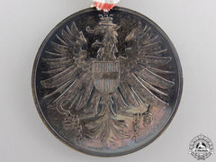 A 1964 Innsbruck Olympic Games Medal With Case