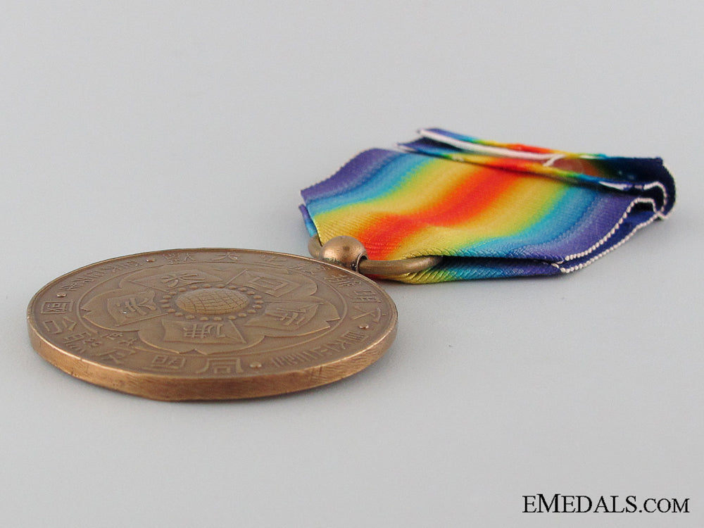japanese_wwi_victory_medal,_official_issue_img_06.jpg52ed54ad2ea31