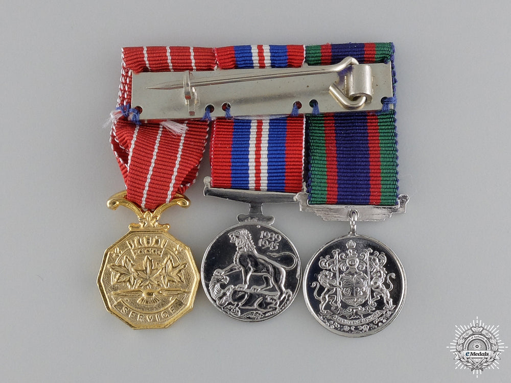 a_second_war_rcaf_medal_group_to_squadron_leader_macdonald_img_06.jpg54b80a8cd1763