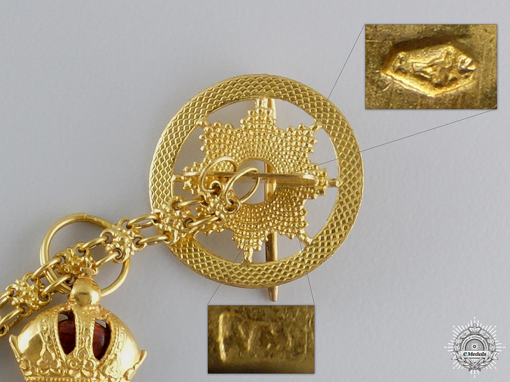 austria,_empire._an_leopold_order_miniature_award_chain_in_gold,_with_case_by_v._mayer_img_07.jpg54c696a14c9c2_1_1