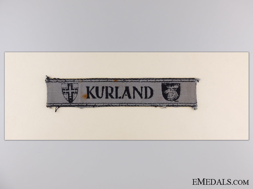 a_kurland_cufftitle_with_documents_img_07.jpg541854aadda72