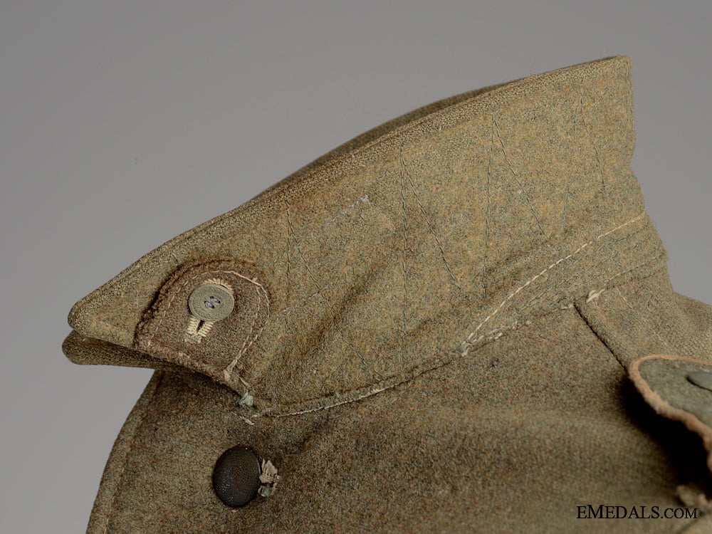 battle_worn_field_blouse&_side_cap,1944_img_08.jpg52e0278f0449a