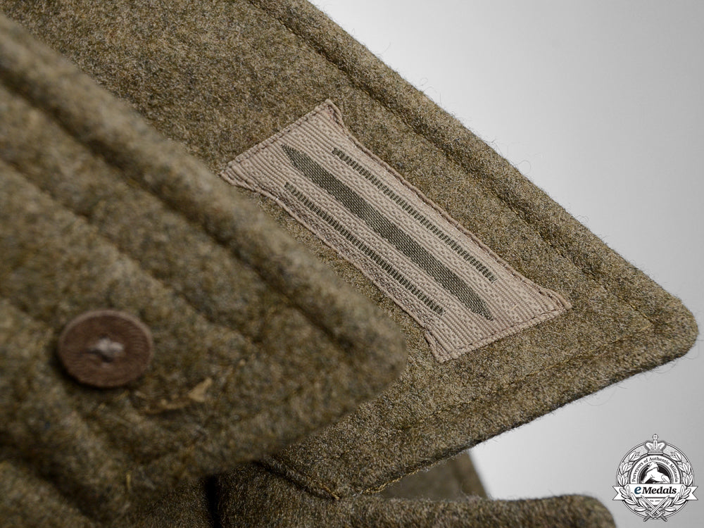 a_german_m44_combat_tunic_with_printed_eagle_img_08.jpg55ad01a55564f