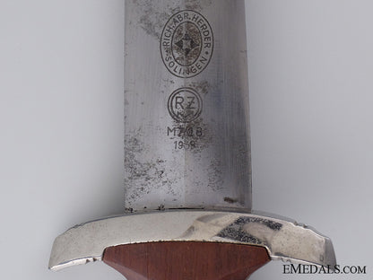 an_sa_dagger_by_richard_abr._herder,_solingen1939_img_08.jpg54414aca569bc