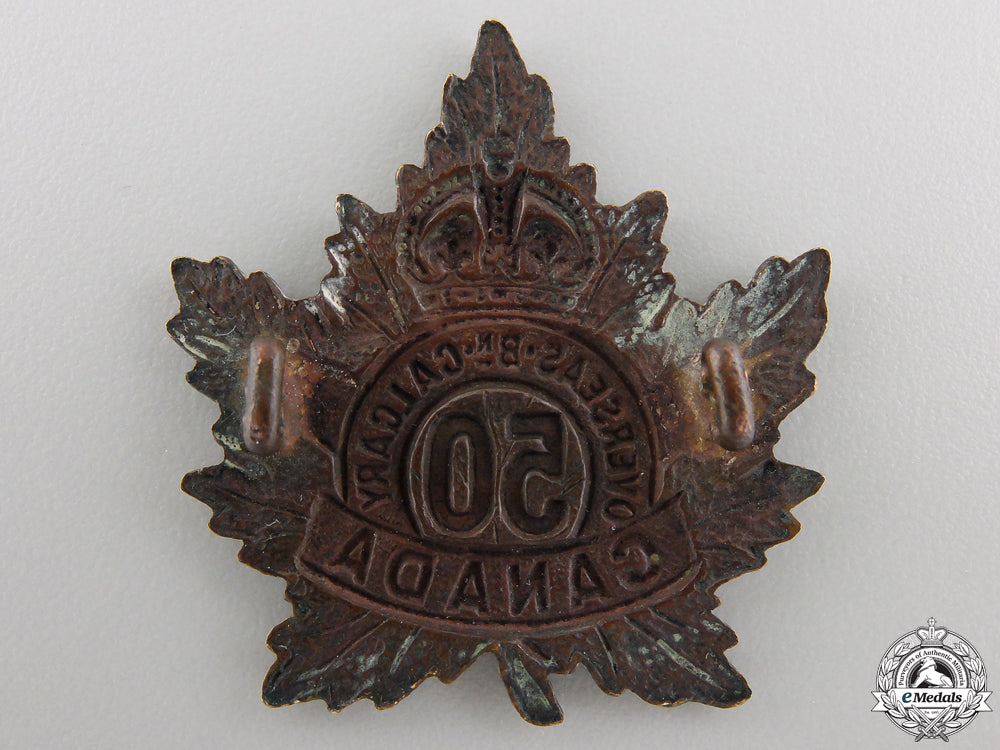 a_first_war50_th_infantry_battalion_cap_badge_img_18.jpg555f60c419437