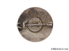 Early Propaganda Badge