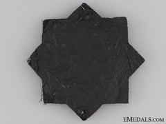 A Luftwaffe Issue German Cross In Gold