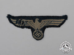 A Third Reich Period German Wehrmacht Heer (Army) Cap Insignia