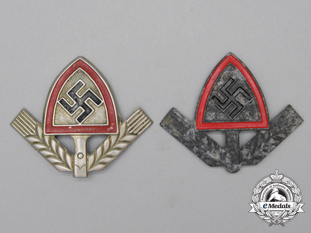 a_grouping_of_two_rad(_national_labour_service)_cap_badges_j_098_1