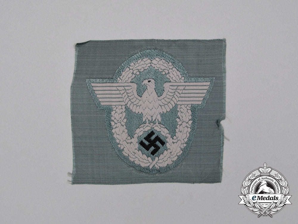 a_mint_and_unissued_third_reich_period_german_police/_gendarmerie_officer’s_sleeve_insignia_j_109_1