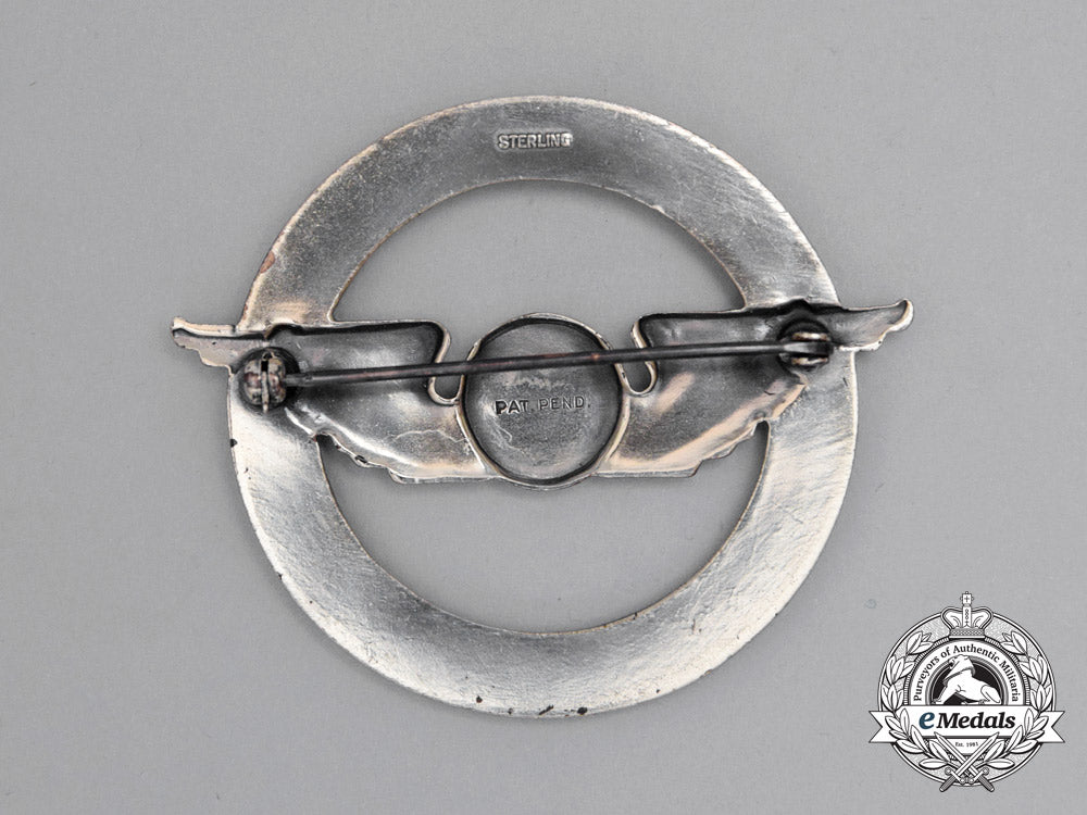 a_civil_aeronautics_administration(_caa)_war_training_service_cap_badge_j_267_1
