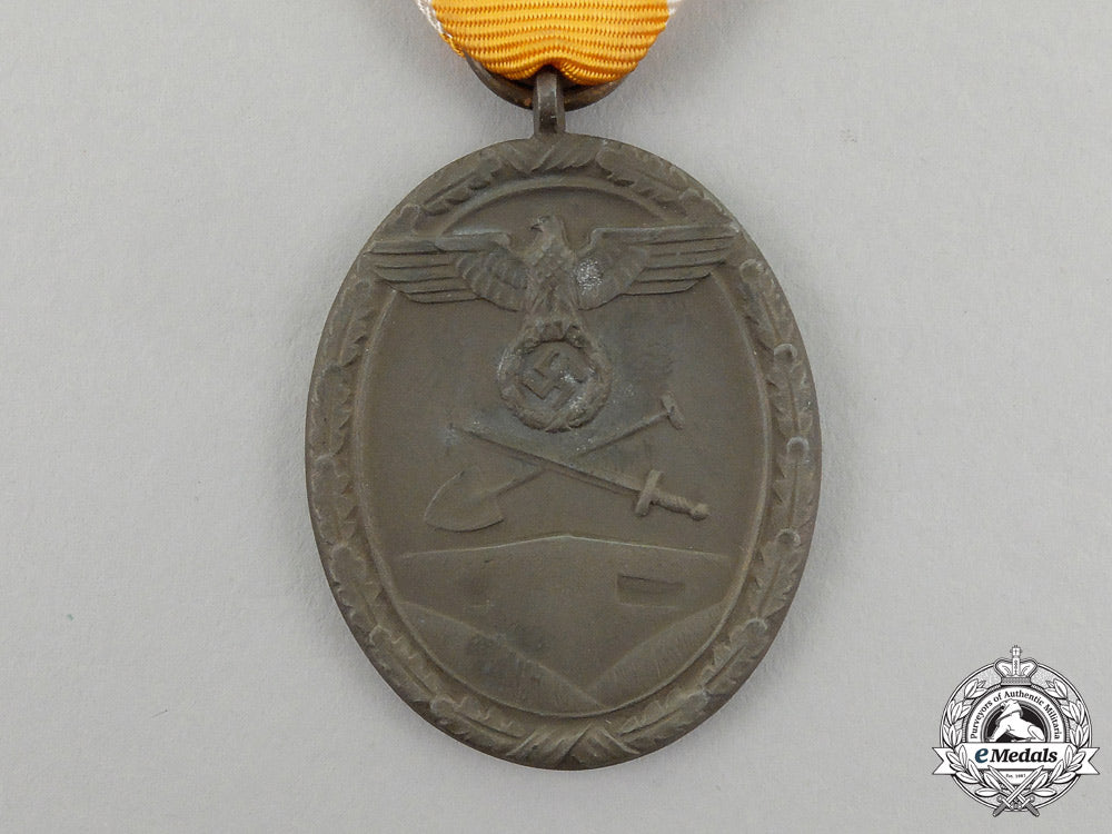 a_german_west_wall_medal_in_its_original_packet_of_issue_by_carl_poellath_j_791
