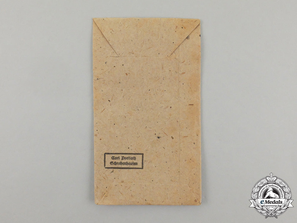a_german_west_wall_medal_in_its_original_packet_of_issue_by_carl_poellath_j_795