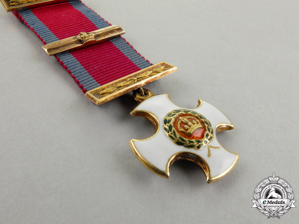 united_kingdom._a_miniature_british_distinguished_service_order_in_gold_j_990_1