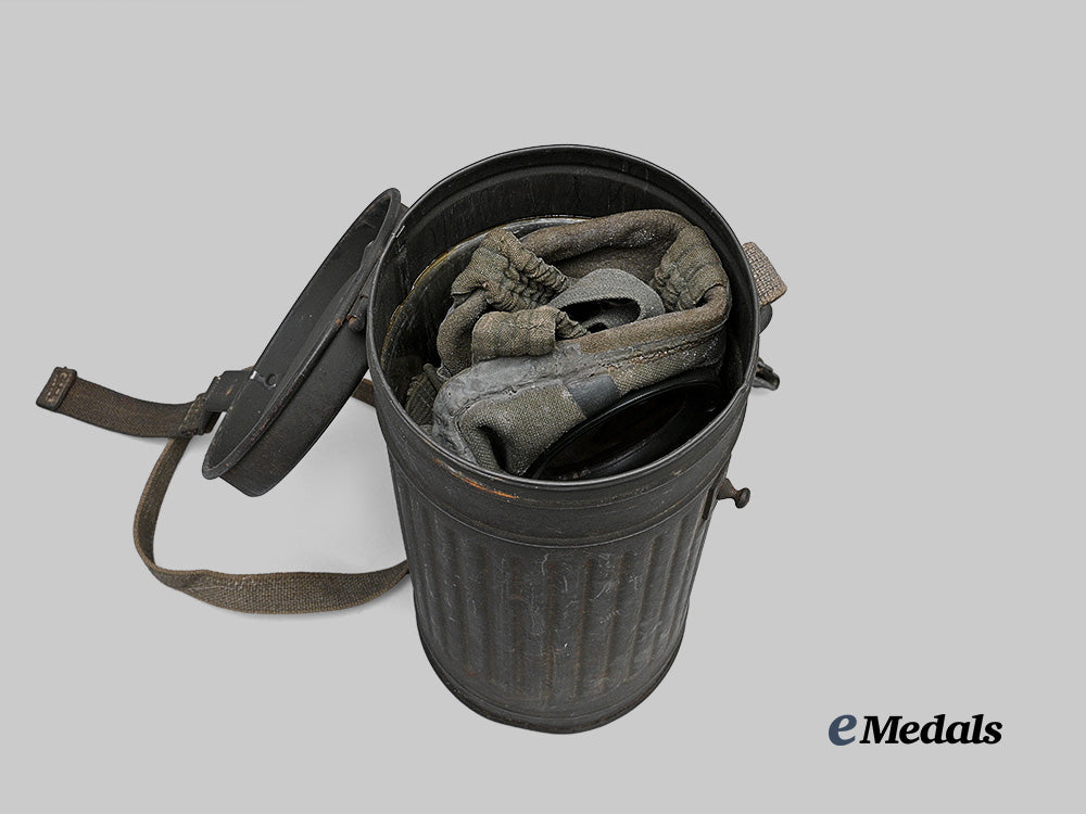 germany,_wehrmacht._an_m30_gas_mask,_with_canister_e_medals__g62679_5