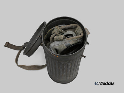 germany,_wehrmacht._an_m30_gas_mask,_with_canister_e_medals__g62679_5