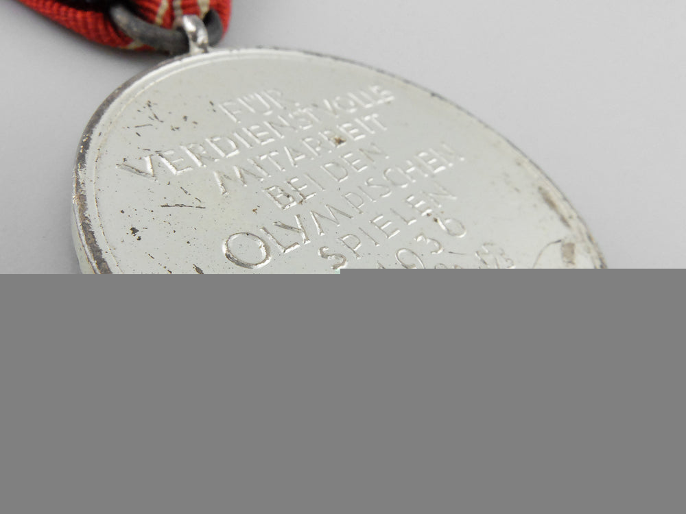 a_xi_summer_olympic_games_medal_with_case_k_020
