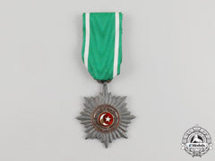 A Unique Silver Grade Eastern People’s Bravery Decoration; 2Nd Class
