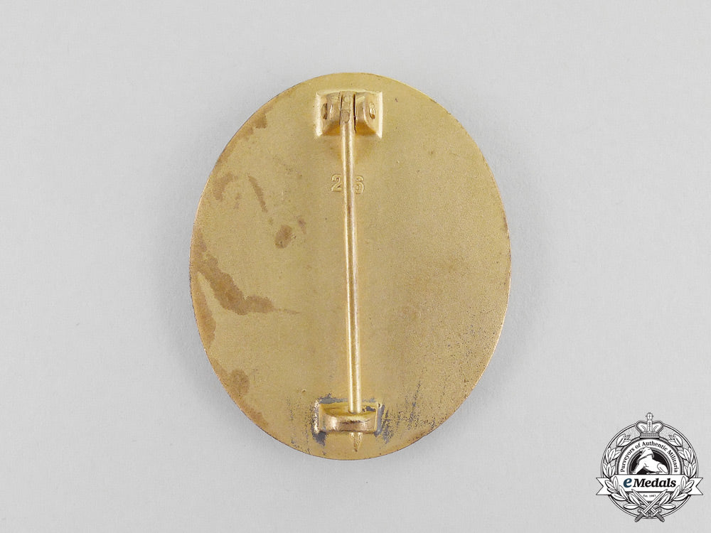 a_second_war_german_gold_grade_wound_badge_by_b.h._mayer_k_310_1