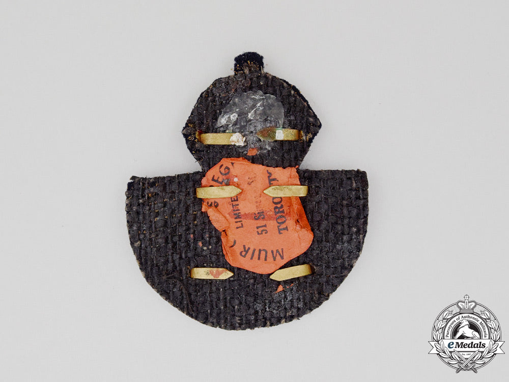 a_second_war_royal_canadian_air_force(_rcaf)_officer's_cap_badge_k_320_2