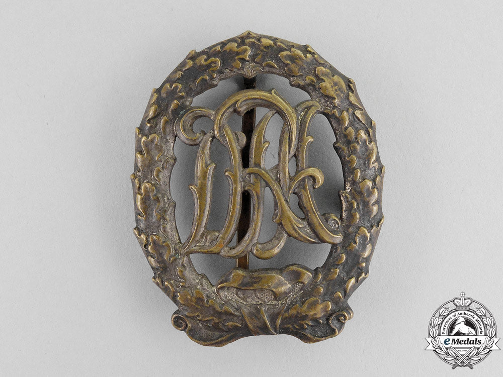 a_silver_grade_drl_sports_badge_with_miniature_stickpin;1957_version_k_326_1