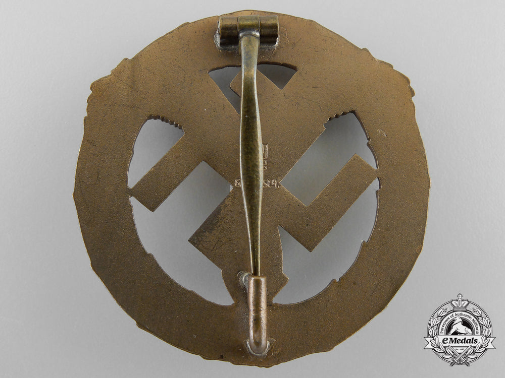 germany,_wehrmacht._a_scarce_motor_sport_badge_with_award_document;_published_example_k_379_2_1_1_1_1