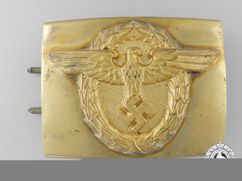 a_rural_police_officer’s_buckle;_published_example_k_494