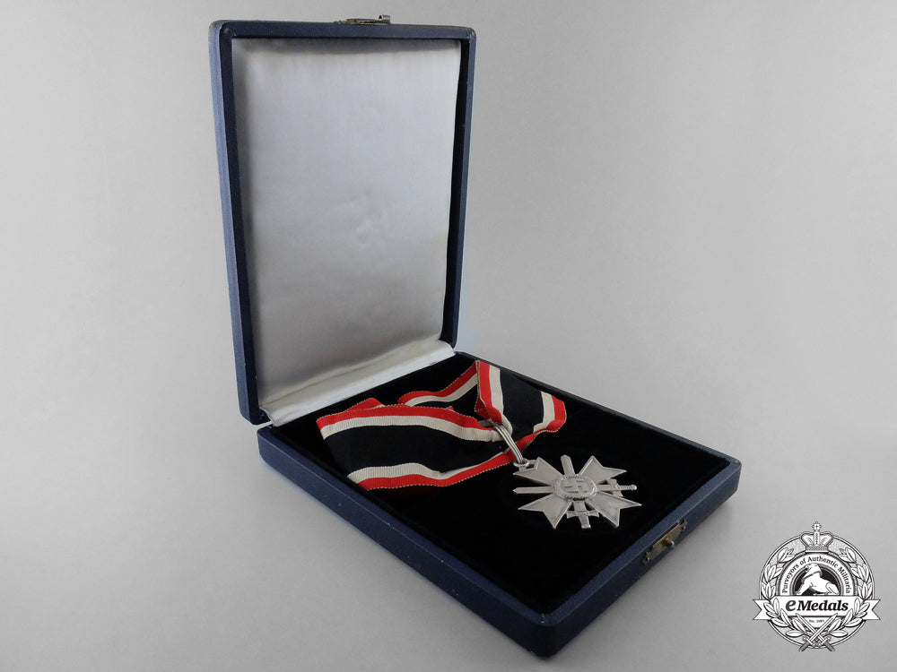 a_knight's_cross_of_the_war_merit_cross_with_swords_by_deschler,_in_case_of_issue_k_950