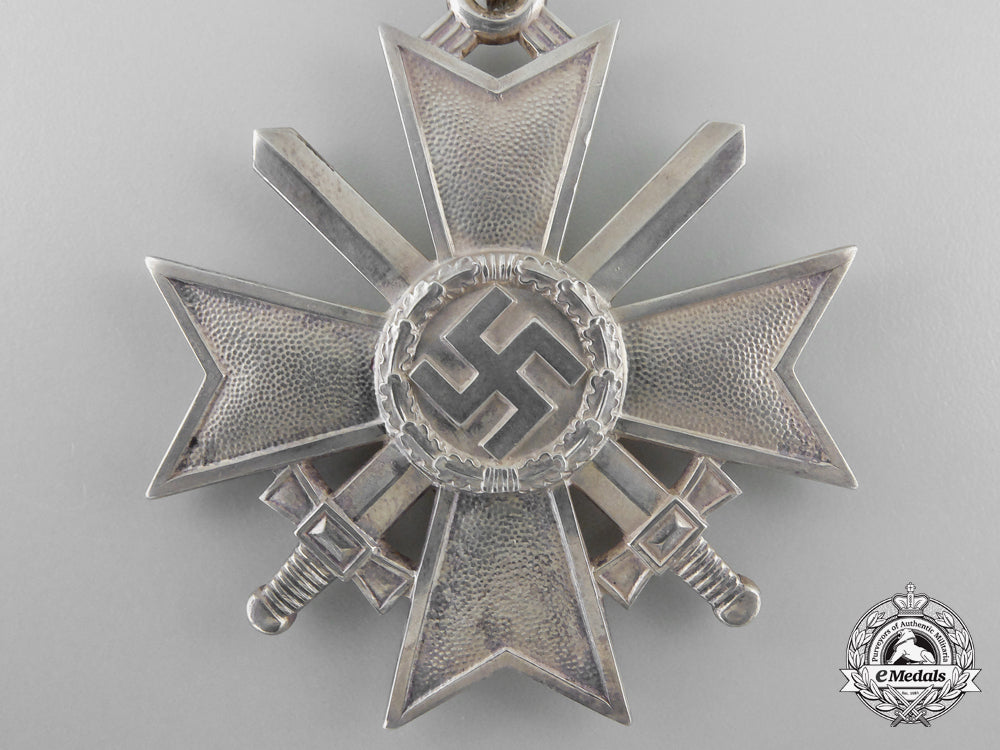 a_knight's_cross_of_the_war_merit_cross_with_swords_by_deschler,_in_case_of_issue_k_953