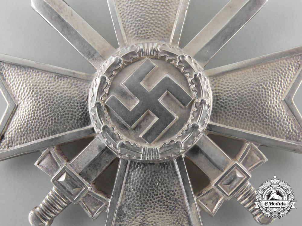 a_knight's_cross_of_the_war_merit_cross_with_swords_by_deschler,_in_case_of_issue_k_954
