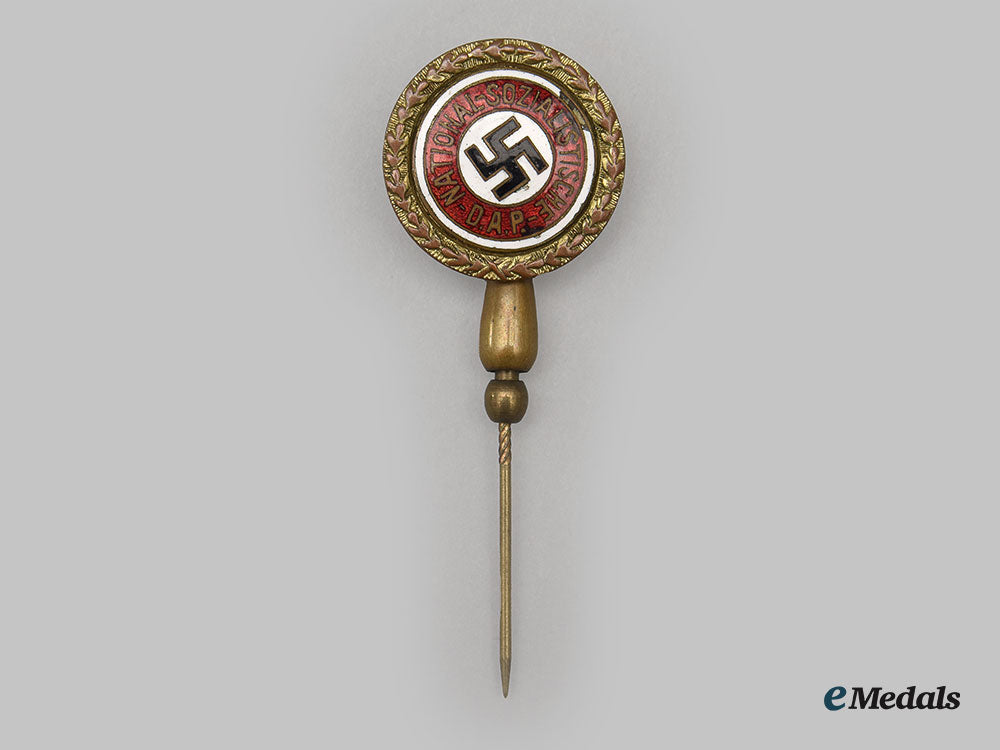 germany,_nsdap._a_golden_party_badge,_small_version_modified_to_stick_pin,_with_award_document_to_erich_hartmann_l22__mnc4413_027
