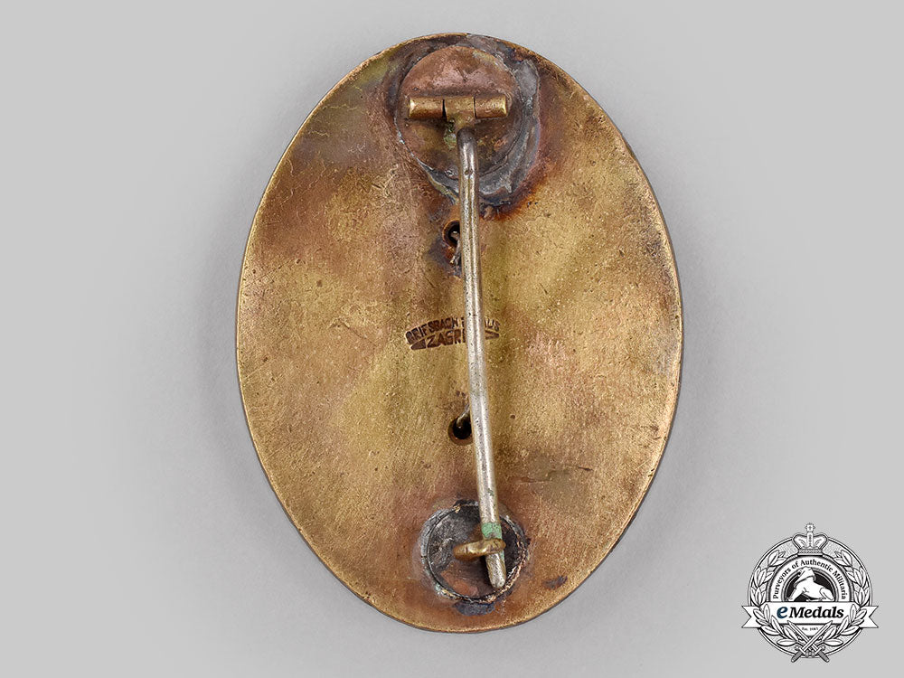 yugoslavia,_kingdom._a_badge_of_the_sworn_game_warden,_by_griesbach_i_knaus,_zagreb_l22_l22_mnc9592_486_936
