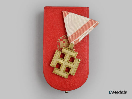 austria,_republic._an_honour_badge_for_the_merit_of_the_republic_of_austria,_gold_merit_cross_by_reitterer_l22_mnc0028_497