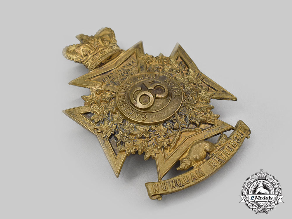 canada,_dominion._a65_th_regiment,_carabiniers_mont-_royal(_mount_royal_rifles)_helmet_plate_with_queen's_crown,_c.1889_l22_mnc0251_967_1