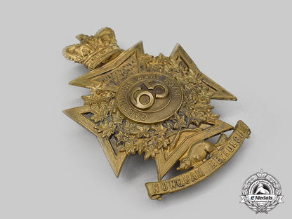 canada,_dominion._a65_th_regiment,_carabiniers_mont-_royal(_mount_royal_rifles)_helmet_plate_with_queen's_crown,_c.1889_l22_mnc0251_967_1