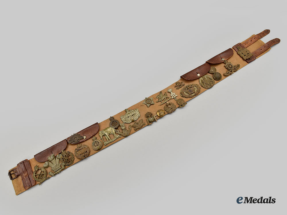 united_kingdom._a_first_world_war_belt_with_souvenir_buttons_and_cap_badges_l22_mnc0289_555