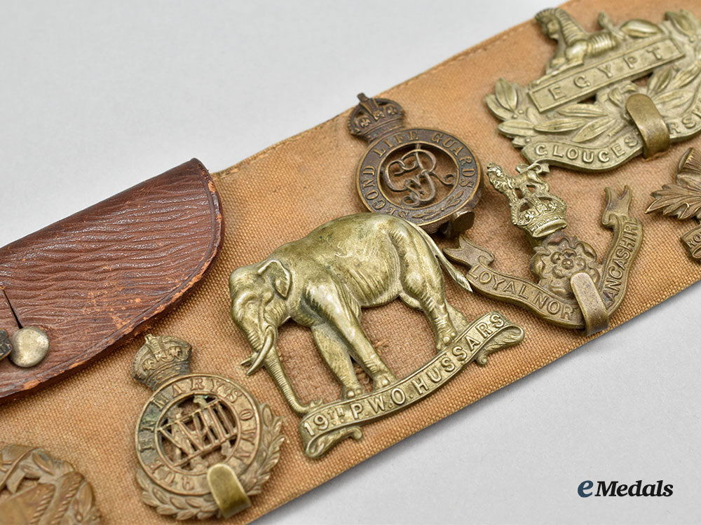 united_kingdom._a_first_world_war_belt_with_souvenir_buttons_and_cap_badges_l22_mnc0293_559