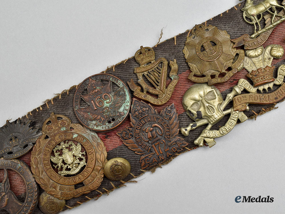 united_kingdom._a_unique_belt_with_souvenir_buttons_and_cap_badges_l22_mnc0309_572