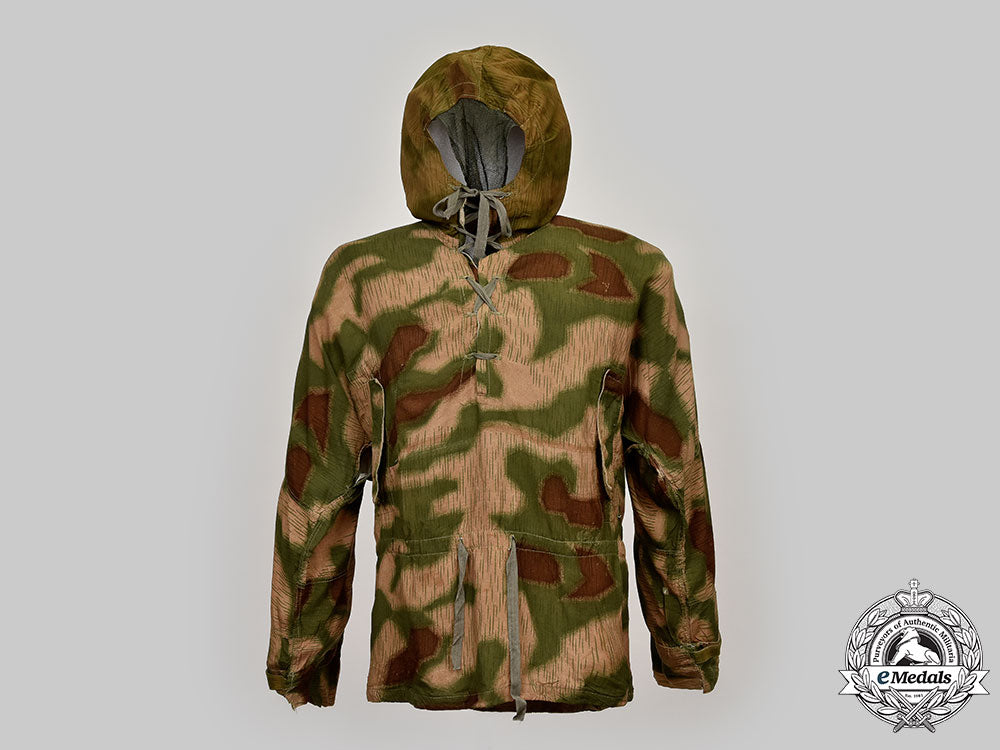 germany,_heer._a_rare_camouflage_smock_and_award_documents_to_sniper_obergefreiter_august_pamann,33_confirmed_kills_l22_mnc0310_183_1