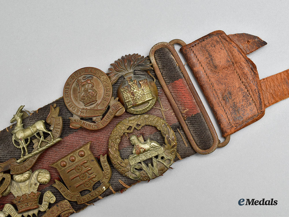 united_kingdom._a_unique_belt_with_souvenir_buttons_and_cap_badges_l22_mnc0310_573