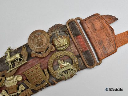 united_kingdom._a_unique_belt_with_souvenir_buttons_and_cap_badges_l22_mnc0310_573