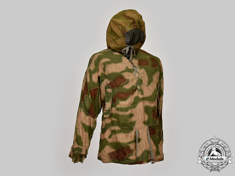 germany,_heer._a_rare_camouflage_smock_and_award_documents_to_sniper_obergefreiter_august_pamann,33_confirmed_kills_l22_mnc0311_182_1