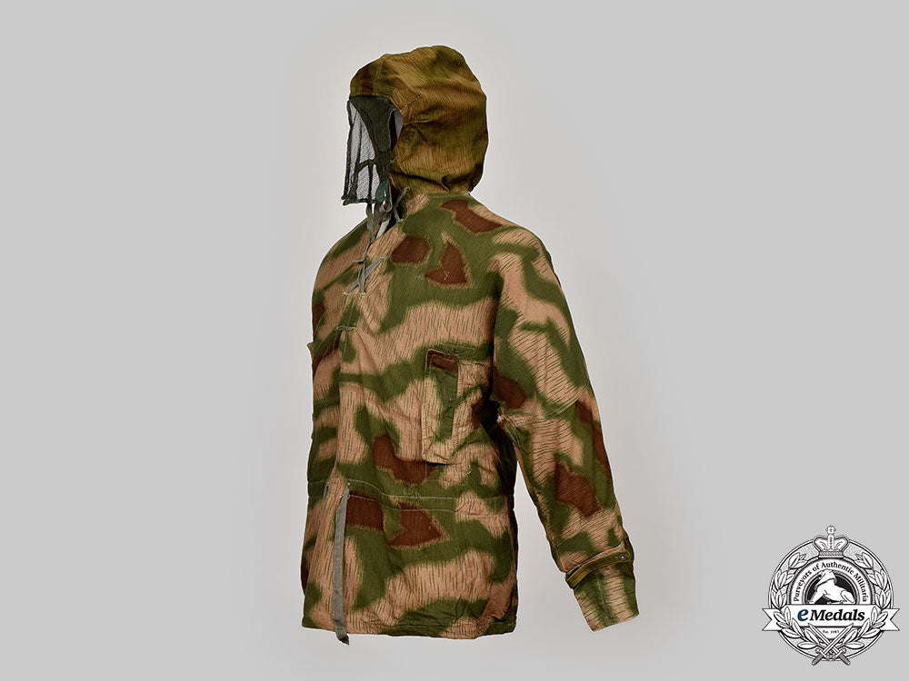 germany,_heer._a_rare_camouflage_smock_and_award_documents_to_sniper_obergefreiter_august_pamann,33_confirmed_kills_l22_mnc0312_184_1