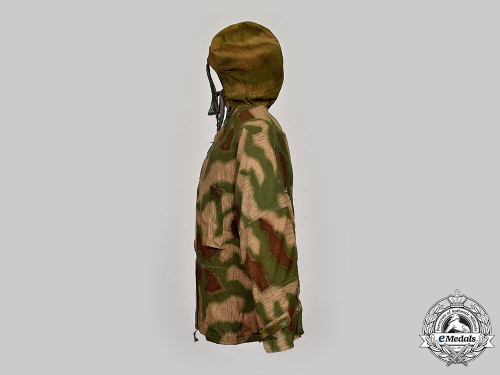 germany,_heer._a_rare_camouflage_smock_and_award_documents_to_sniper_obergefreiter_august_pamann,33_confirmed_kills_l22_mnc0313_185_1