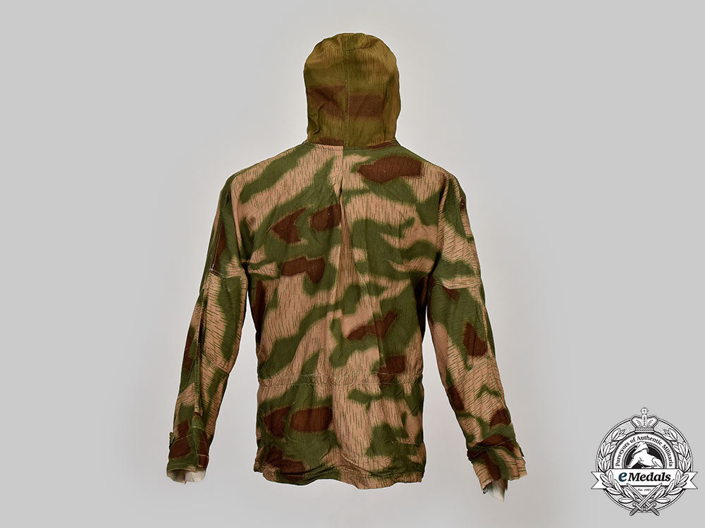 germany,_heer._a_rare_camouflage_smock_and_award_documents_to_sniper_obergefreiter_august_pamann,33_confirmed_kills_l22_mnc0315_187_1