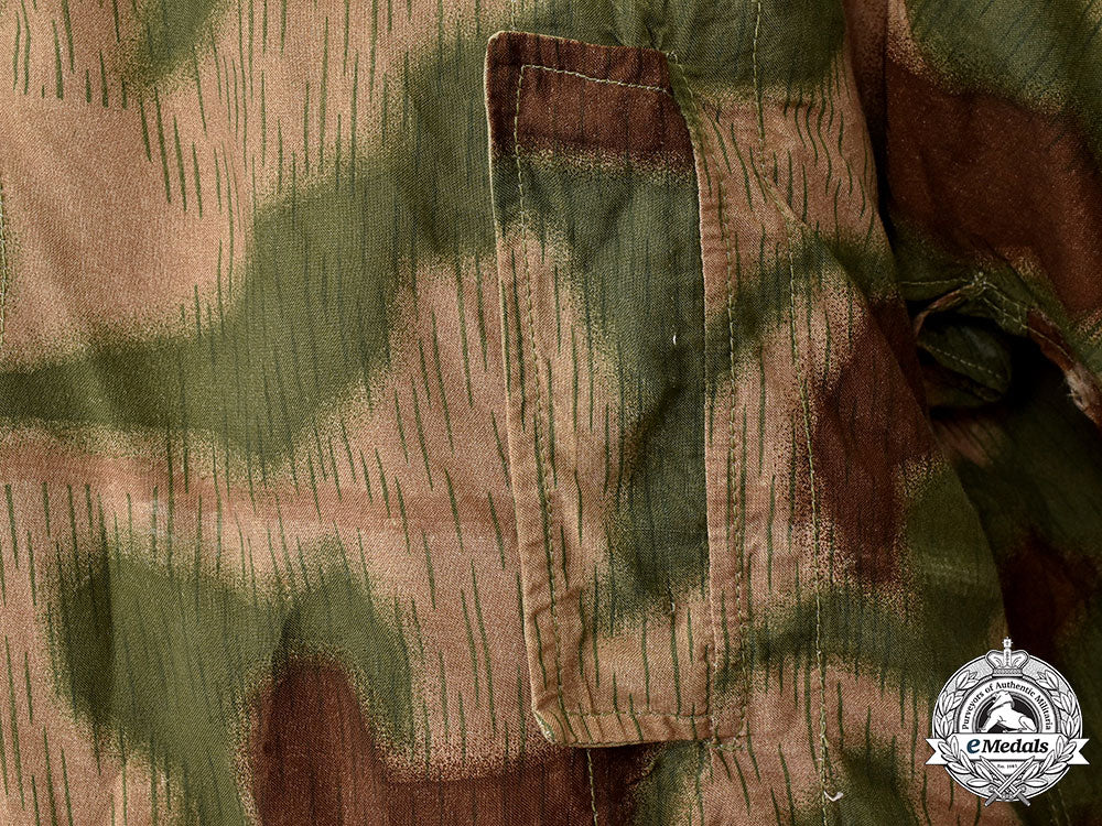 germany,_heer._a_rare_camouflage_smock_and_award_documents_to_sniper_obergefreiter_august_pamann,33_confirmed_kills_l22_mnc0318_190_1
